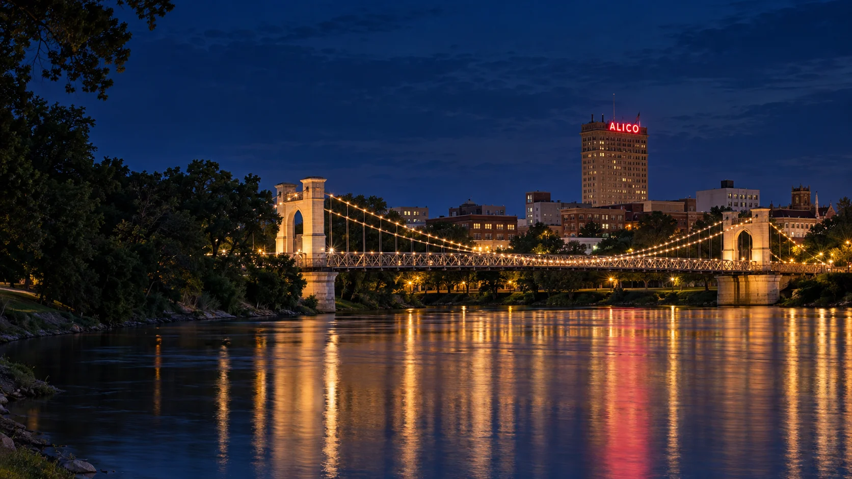 Waco Suspension Bridge and the ALICO skyline at night